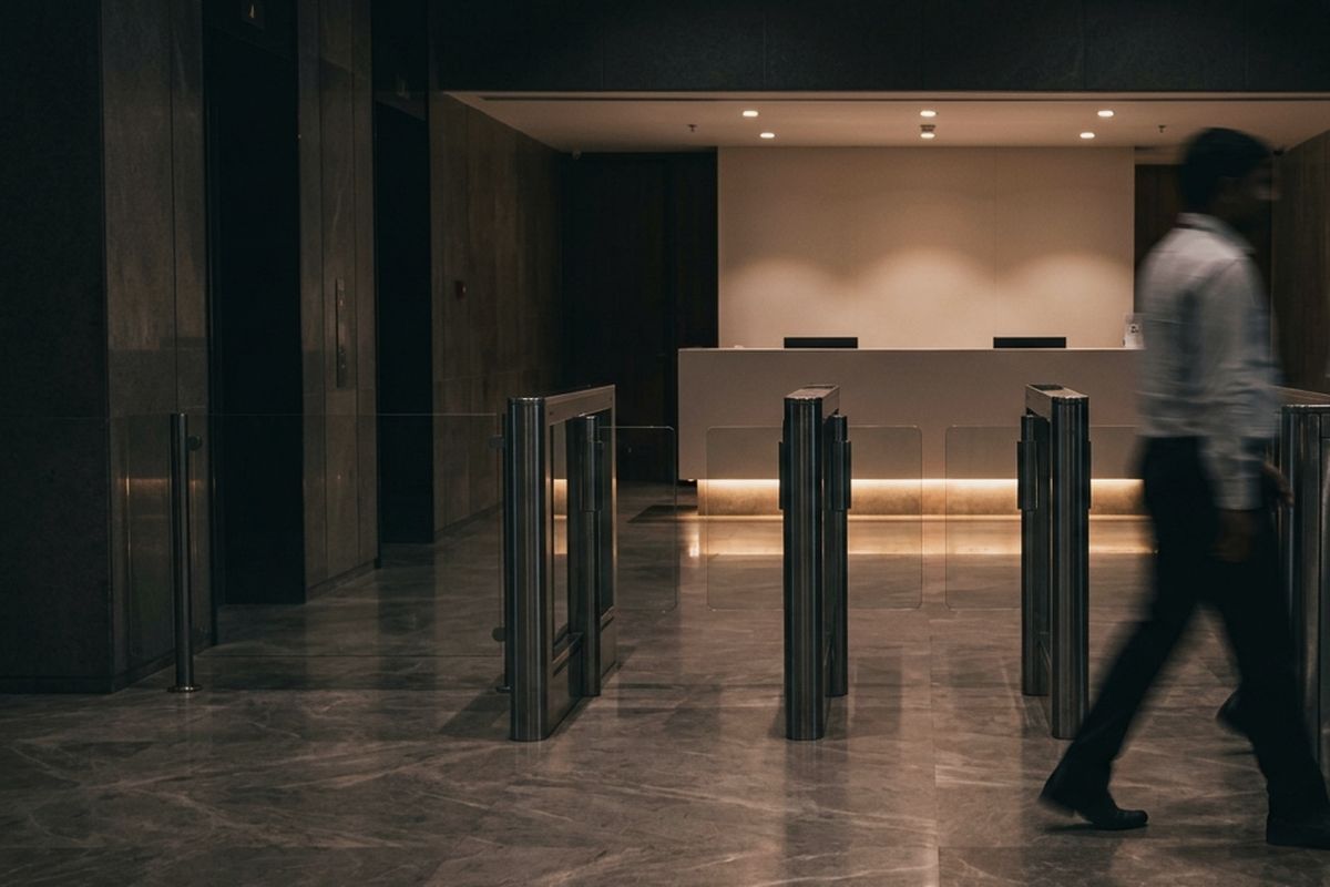 Office lobby with glass turnstiles